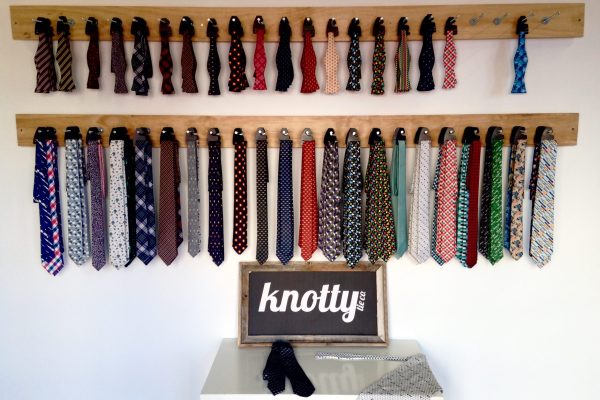 The entryway is filled with custom made ties, all design and produced in house.
