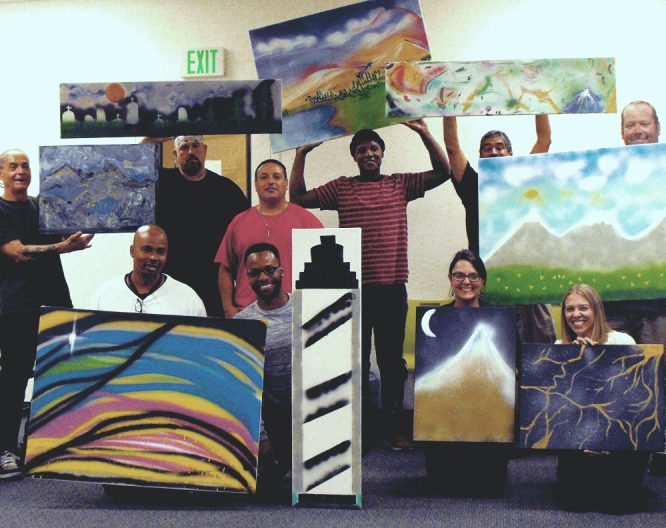 Participants in CEO's transitional employment services gathered together for a paint night at ULC's Tramway Nonprofit Center.