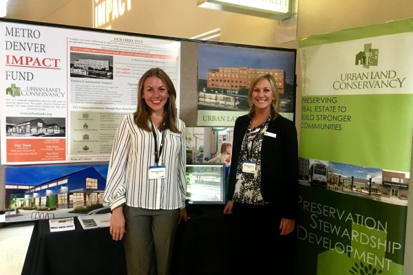 Alana Romans (left) and Christi Smith (right) of Urban Land Conservancy presented the Metro Denver Impact Fund during CO Impact Days' social venture marketplace.