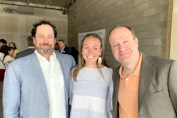 Urban Land Conservancy (ULC) staff with Governor Jared Polis.