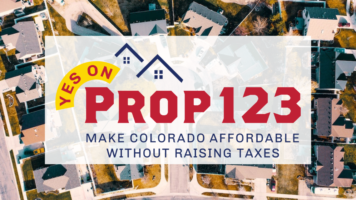 Yes on Prop 123 Logo over a background of houses