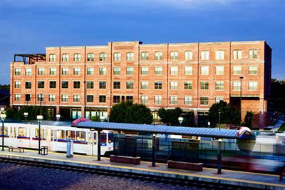 Evan Station in Denver with the lightrail directly in front, part of ULC'S Transit Oriented Development program
